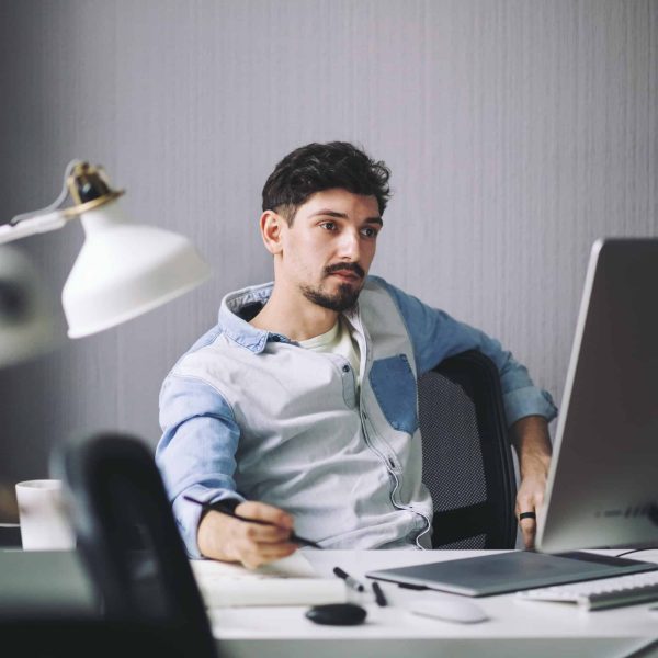 Handsome businessman working in office