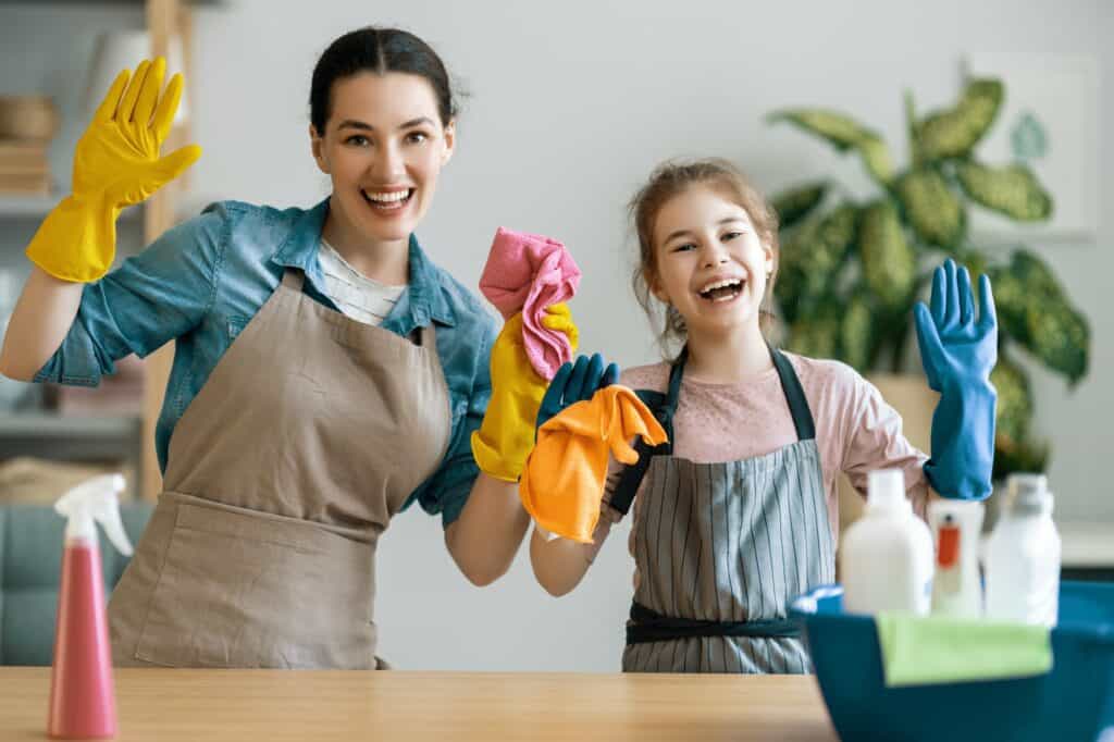 family cleaning the room